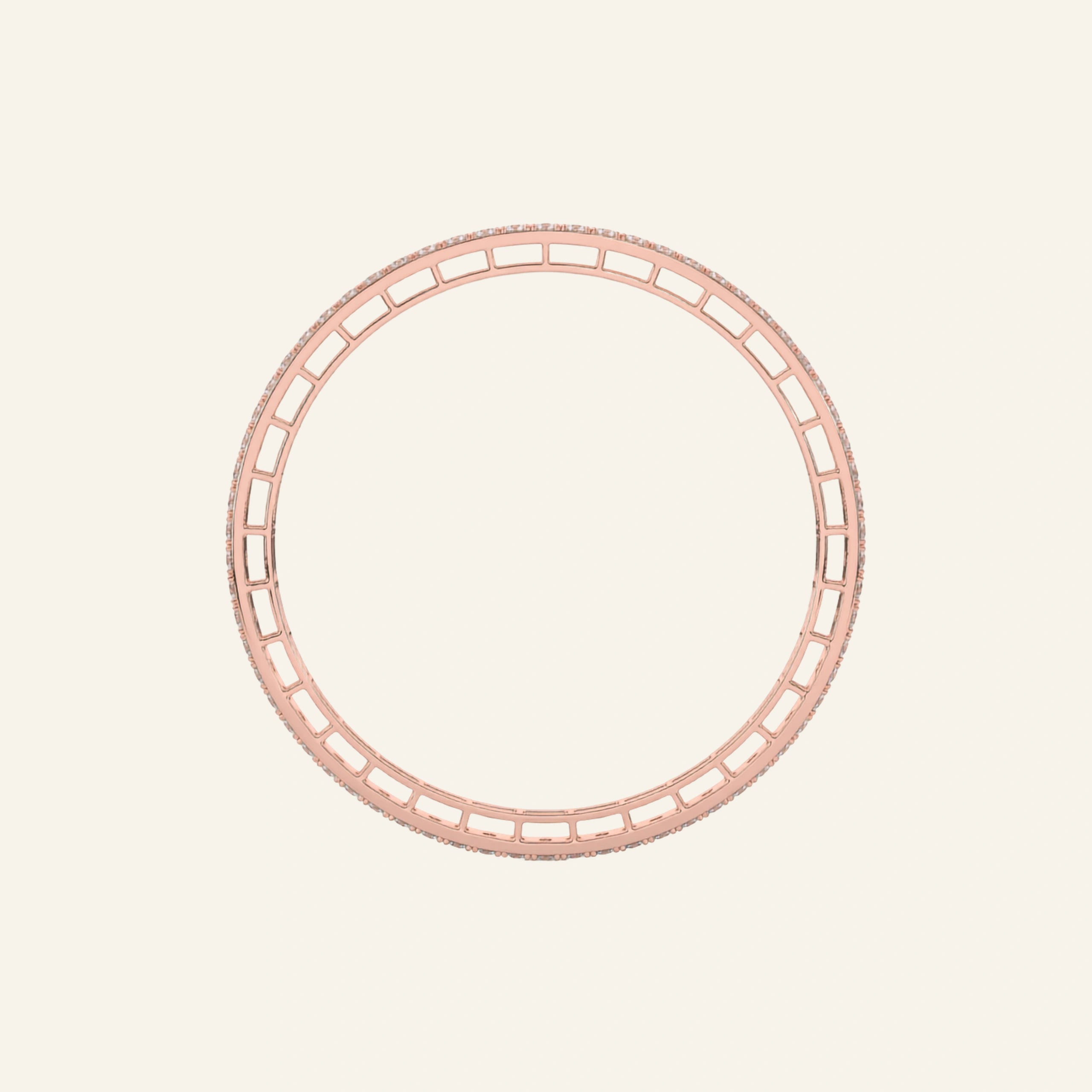 A rose gold bangle bracelet with a textured, openwork geometric pattern, shown on a solid cream background.